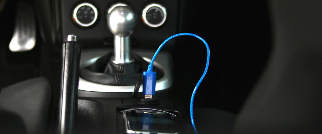 Blue Mini PAC charging in car